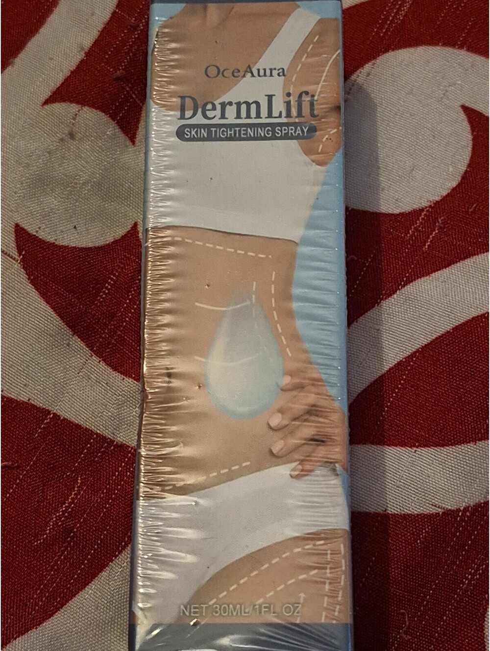 OceAura DermLift Skin Tightening Spray is a 30ml cosmetic body product